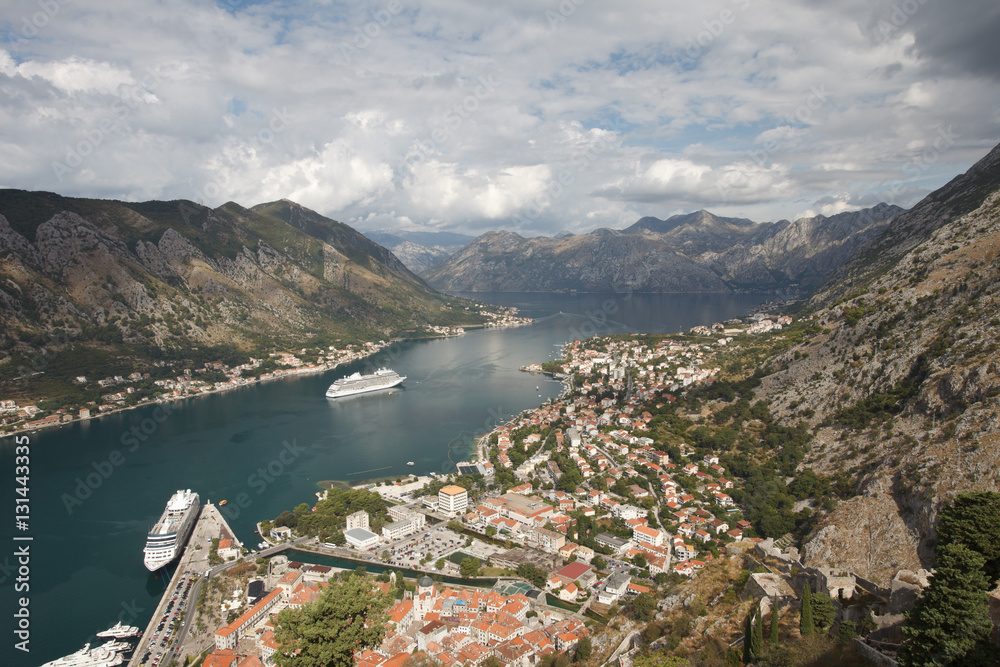 Beautiful cruise ships in the Bay of Kotor near the town of Kotor. View from above