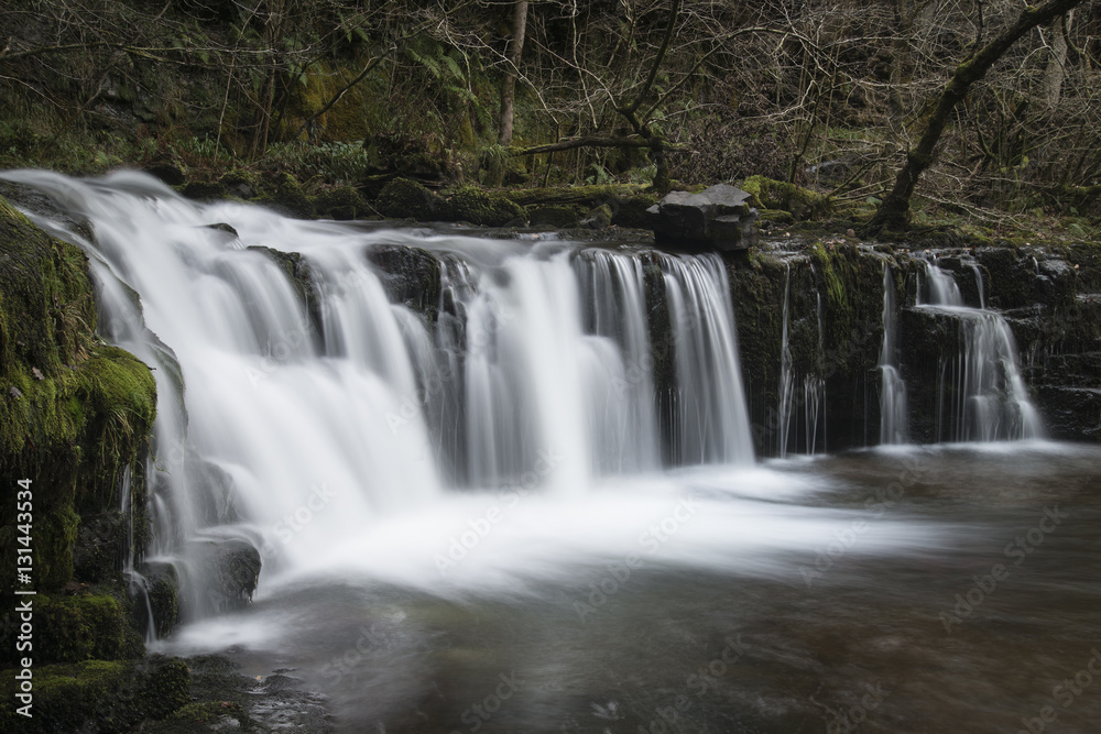 Beautiful waterfall landscape image in forest during Autumn Fall