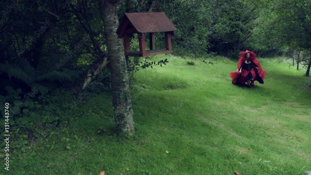 4k Halloween Shot of Red Riding Hood Running in Forest Scared 4k Halloween Shot of Red Riding Hood Running in Forest Scared