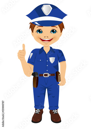 smiling little boy wearing police uniform giving thumbs up