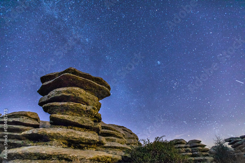 Schistous rock on the starry sky background at night in El Torcal de Antequera natural park, Andalusia, Spain