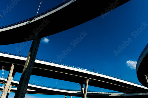 Silhouette of highway ramps on a sunny day