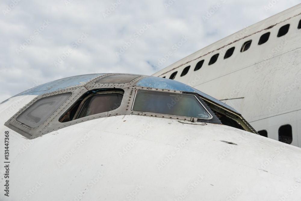 Front of white airplane wreckage Front of white airplane wreckage