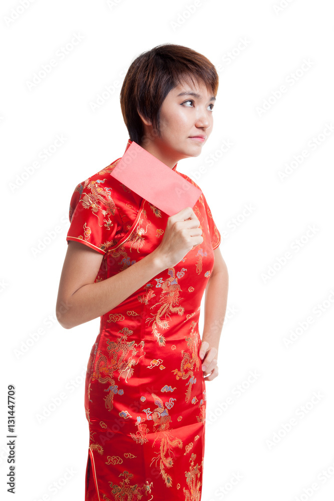 Asian girl in chinese cheongsam dress with red envelope. Asian girl in chinese cheongsam dress with red envelope.