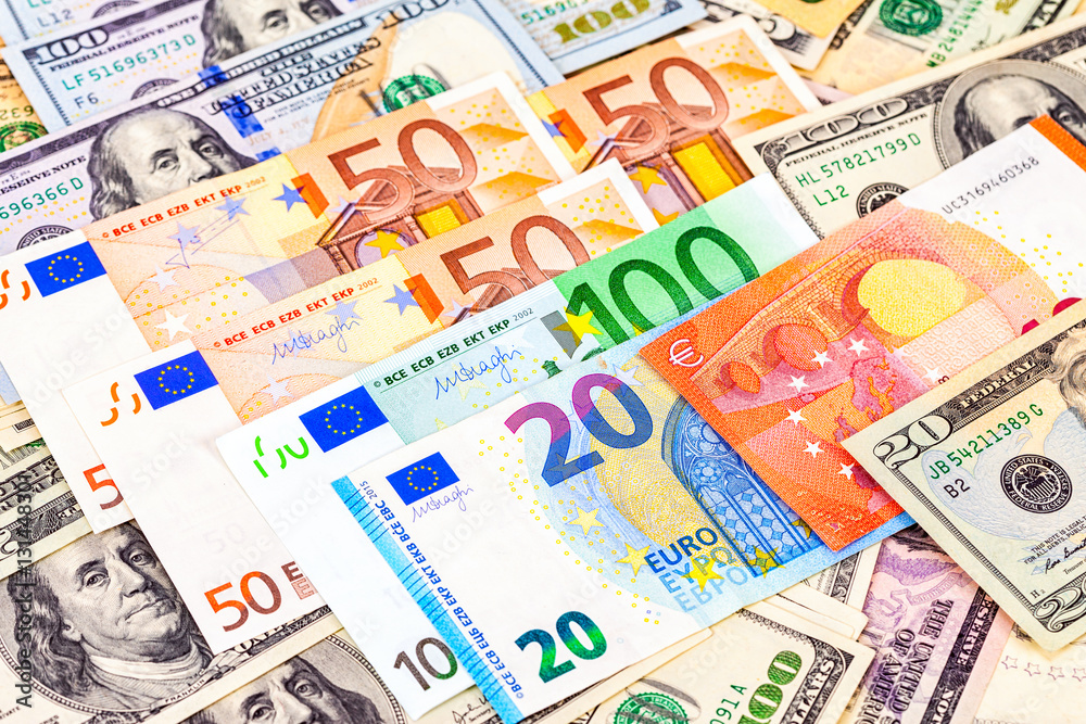 Money background from euro banknotes and american dollars Money background from euro banknotes and american dollars