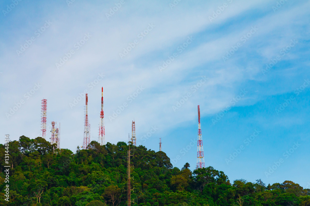 Obraz premium Multiple telecommunication tower on mountain with beauty blue sky