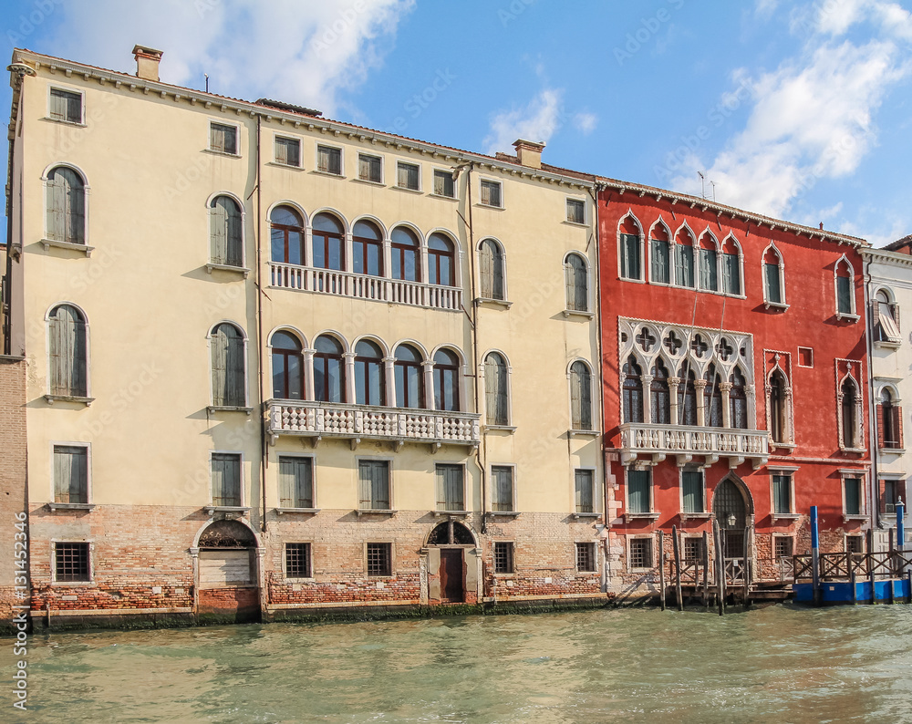 Facades of houses in the Italian Venice over the water