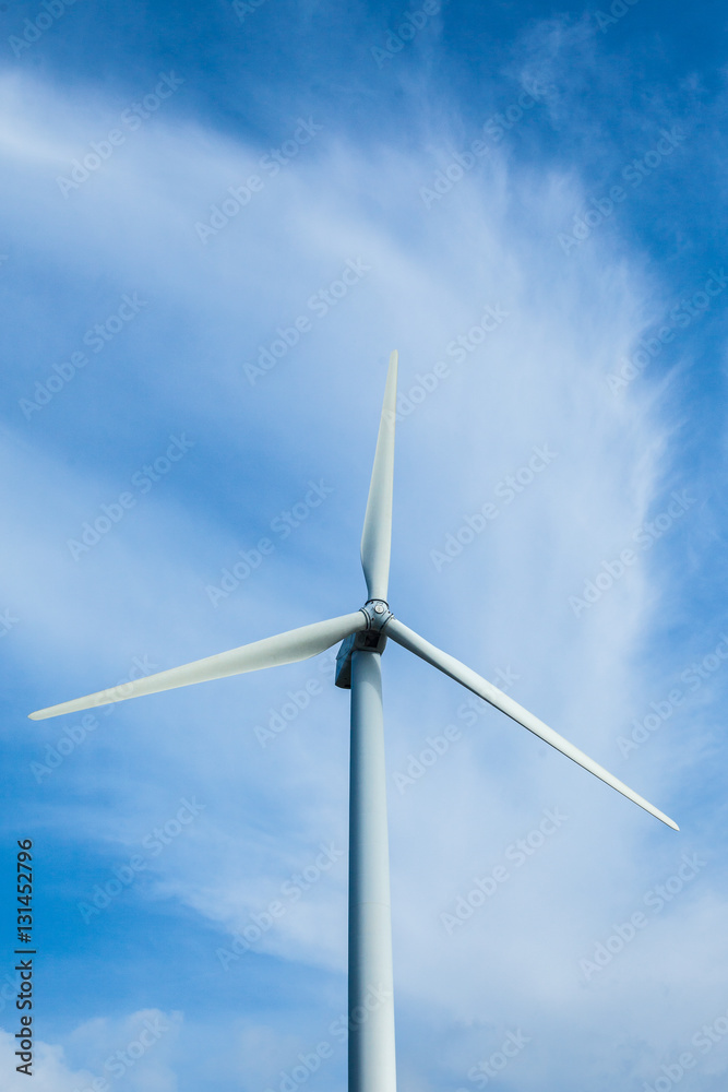 Wind turbines generating electricity on the blue skie Wind turbines generating electricity on the blue skie