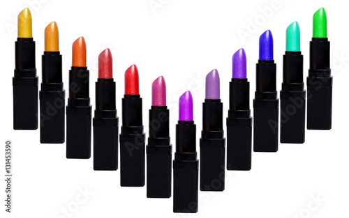 Set of color lipsticks forming V shape. Lipstick set isolated on