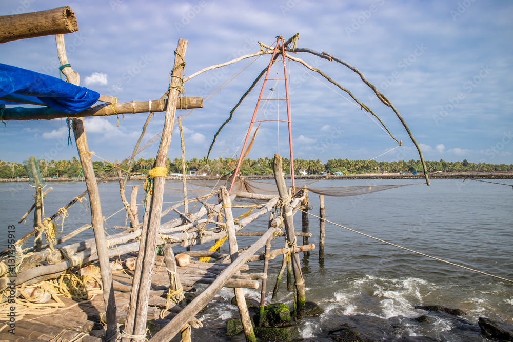 Chinese fishing net on seashore
