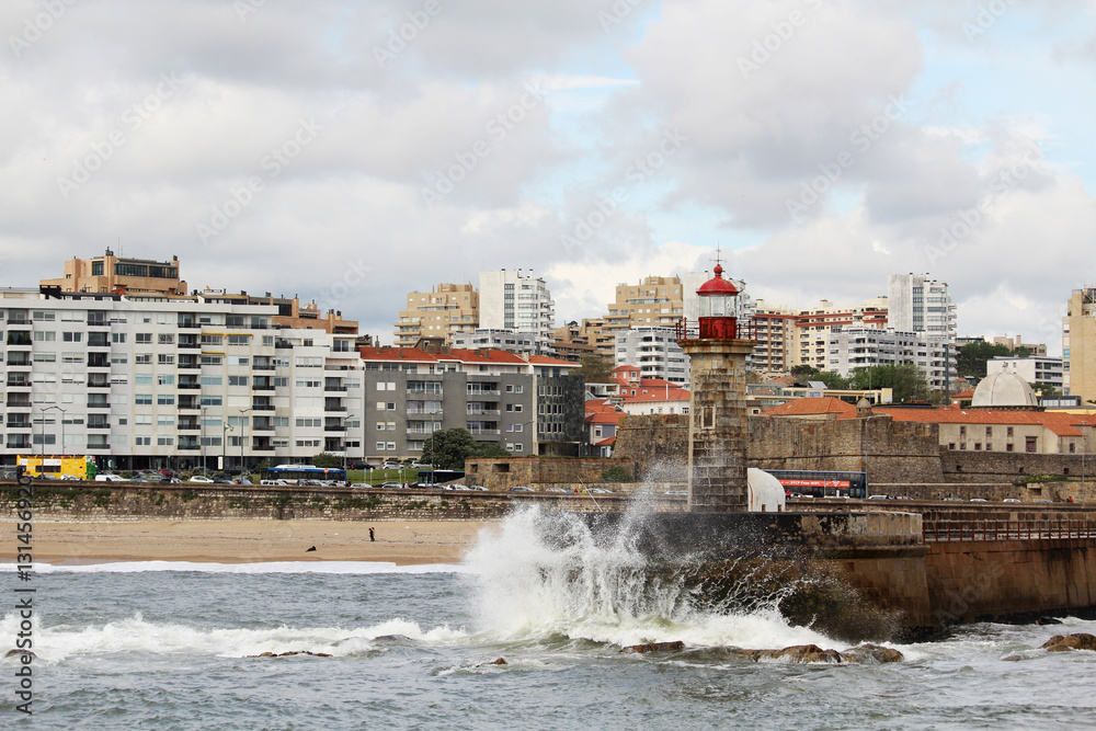A lighthouse at Atlantic Ocean seaside in Porto, Portugal