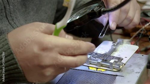 White male setup chips in motherboard smartphone iphone