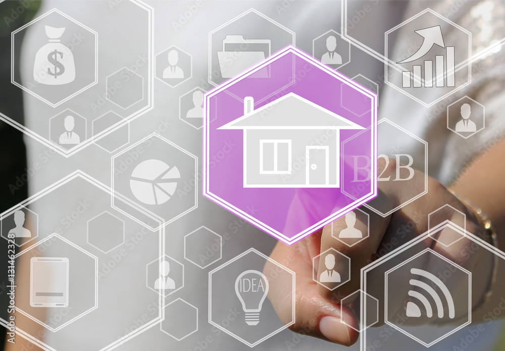 The businesswoman clicks with web touch home on the touch screen with maps of the world.The concept of finding housing for rent or purchase . The businesswoman clicks with web touch home on the touch screen with maps of the world.The concept of finding housing for rent or purchase .