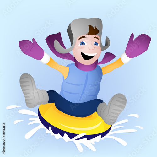 Winter family activity with boy snowtubing