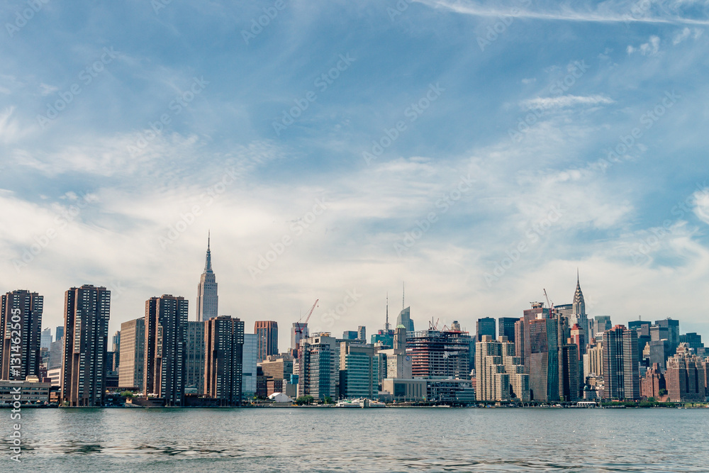 Uptown Manhattan skyline New York. Splittoned image. Uptown Manhattan skyline New York. Splittoned image.