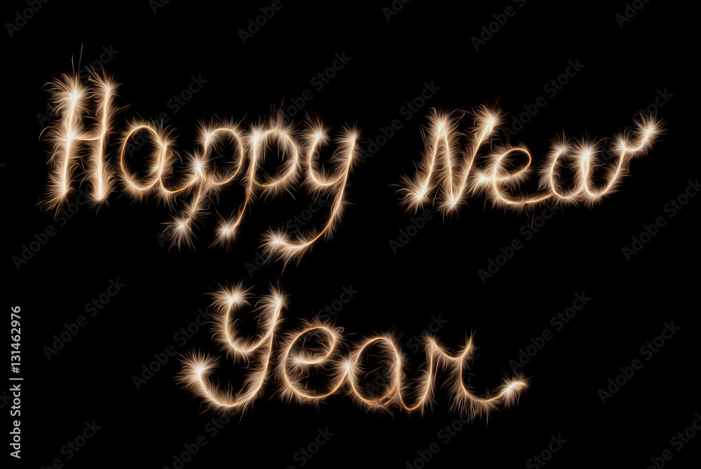 Happy New Year sign sparklers on a dark background. Happy New Year sign sparklers on a dark background.