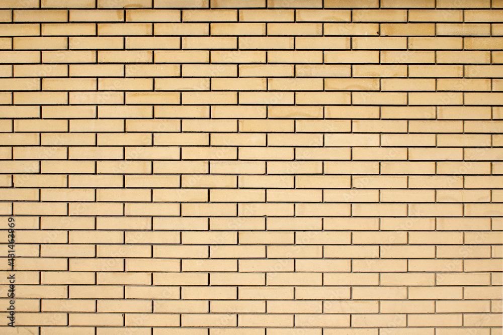 High resolution texture of a yellow brick wall. Laying horizonta High resolution texture of a yellow brick wall. Laying horizonta