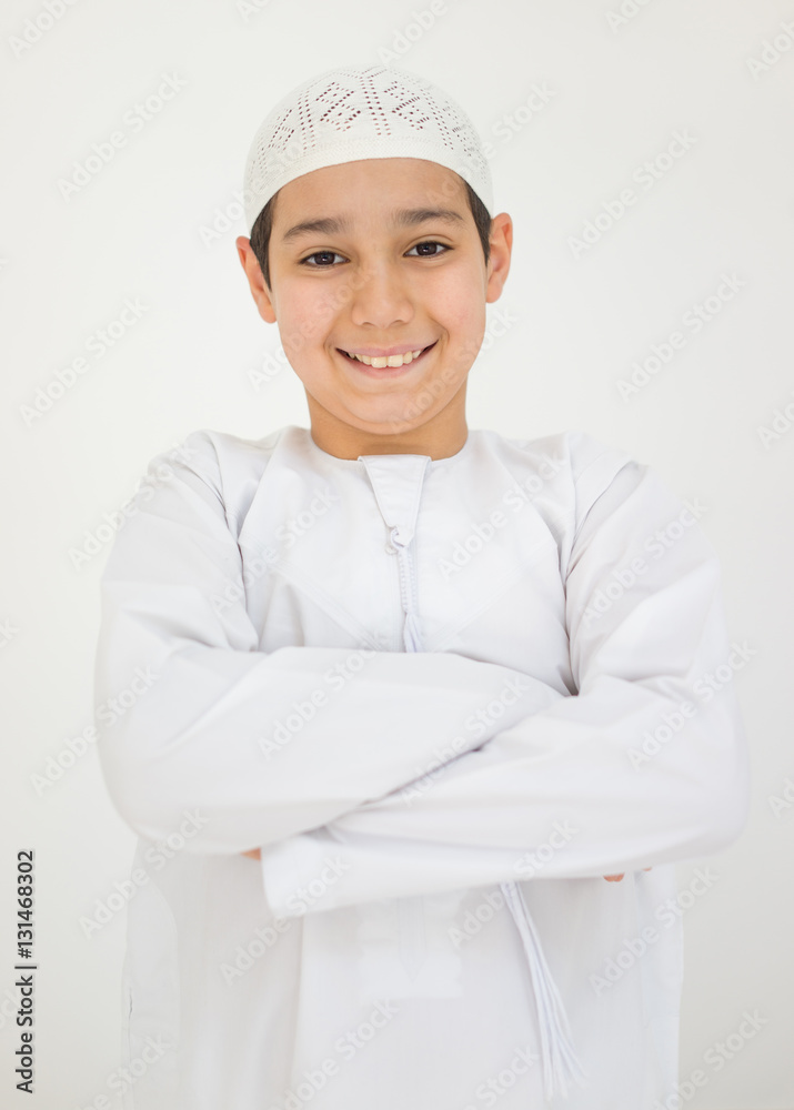 Excited cute Arabic little boy smiling