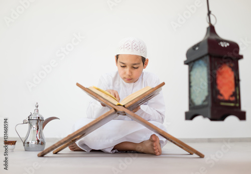 Happy kid with Ramadan lantern