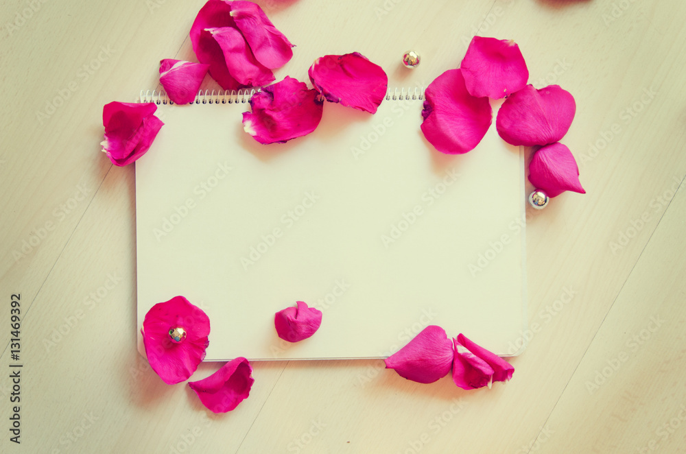 St Valentine's Day blank template for greeting text with note and rose petals St Valentine's Day blank template for greeting text with note and rose petals