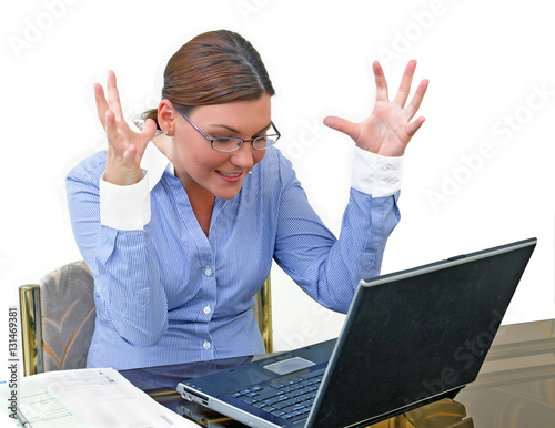 Fotografie Young businesswoman at work with compter and papers stressed
