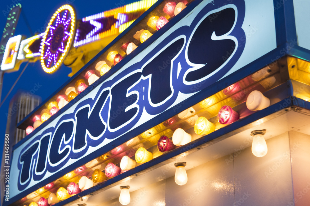 carnival ticket booth marquee with lights at night carnival ticket booth marquee with lights at night