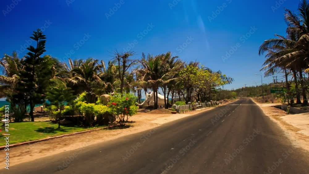 Camera Moves along Road by Sea Beach Houses Palms Camera Moves along Road by Sea Beach Houses Palms