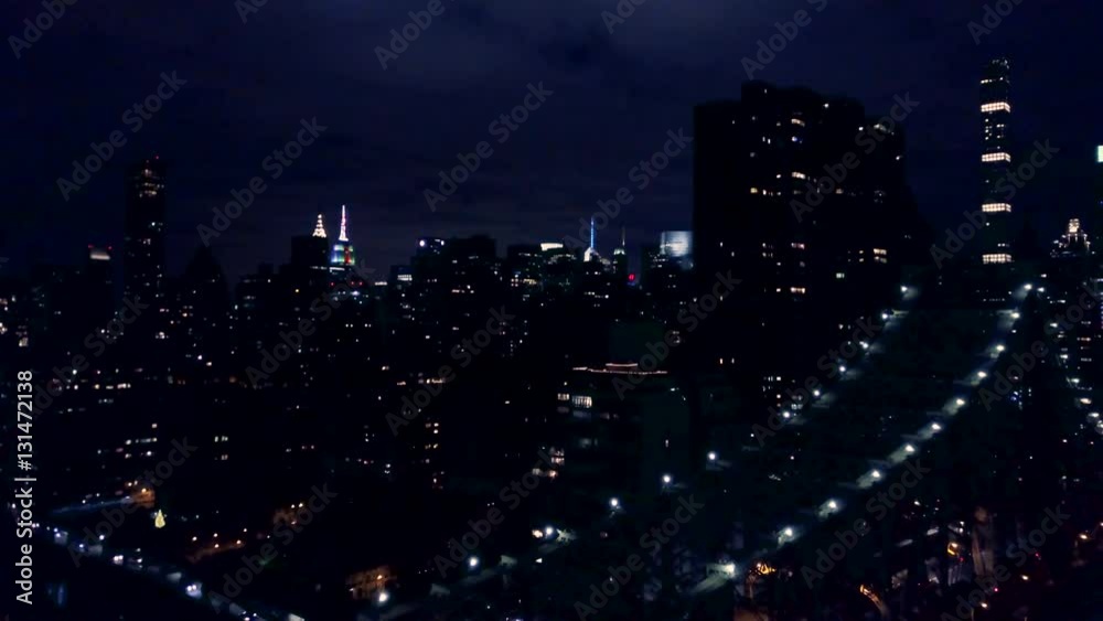 view of New York City flying back over Queensboro Bridge view of New York City flying back over Queensboro Bridge