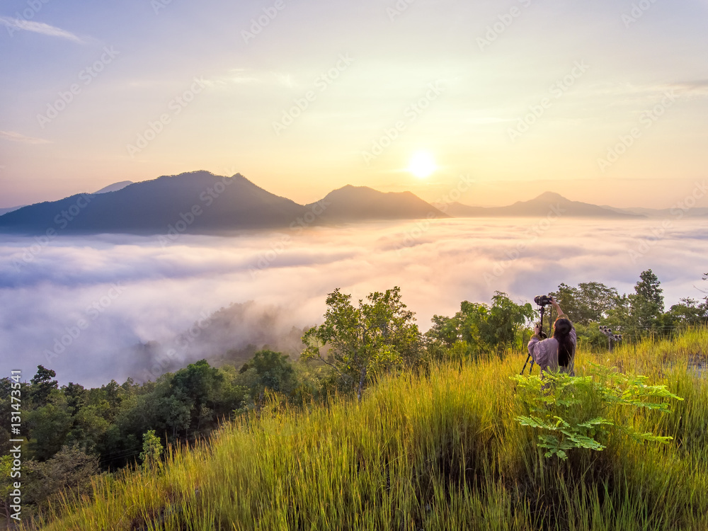 Aerial view of sunrise and fog and mountain in thailand
