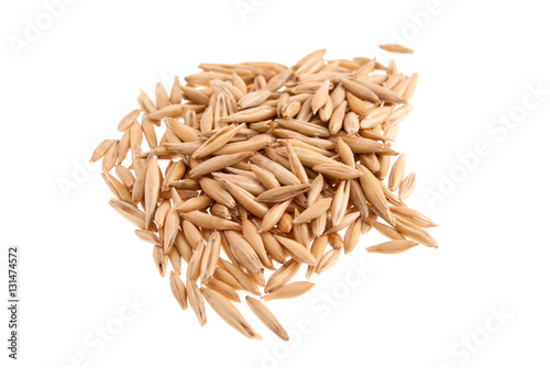 Heap of oat seeds isolated on white background