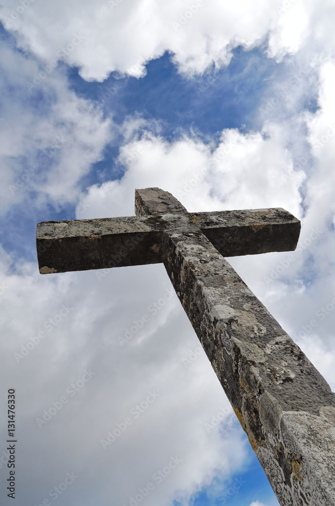 Stone cross in the village of Querenca, Algarve, Portugal