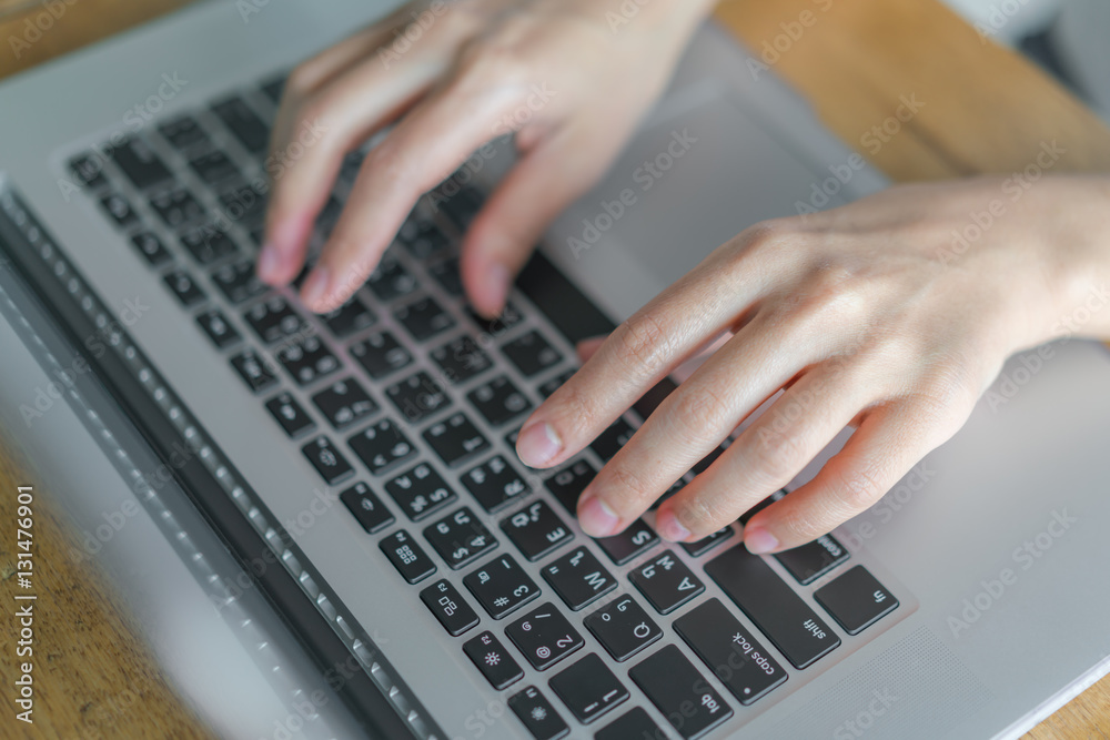 Closeup of business woman hand typing on laptop keyboard . Closeup of business woman hand typing on laptop keyboard .