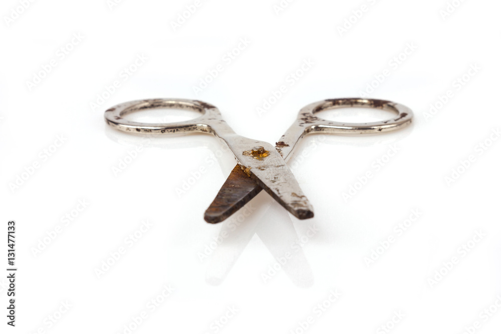 old scissors on a white background old scissors on a white background