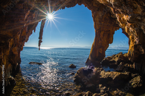 Rock formations on the beach  in Loutra Edipsou, Evia, Greece photo