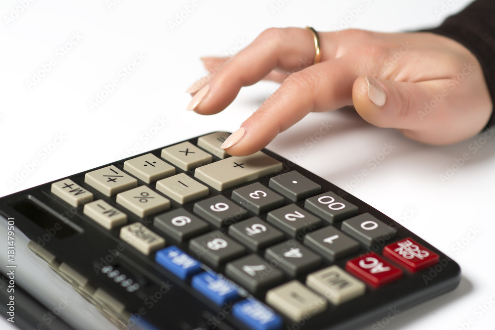 Female finger presses the button Female finger presses the button
