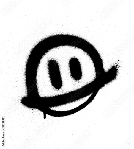 graffiti smiling face emoticon in black on white