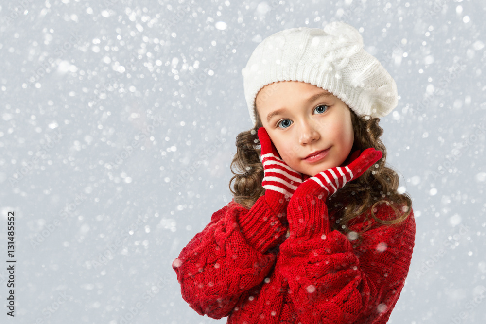 Cute little girl in winter clothes on snow background Cute little girl in winter clothes on snow background