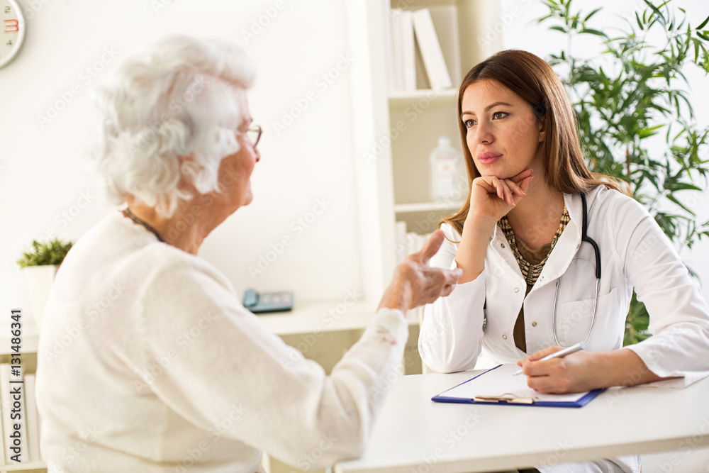 Fototapeta premium Senior woman visiting a doctor