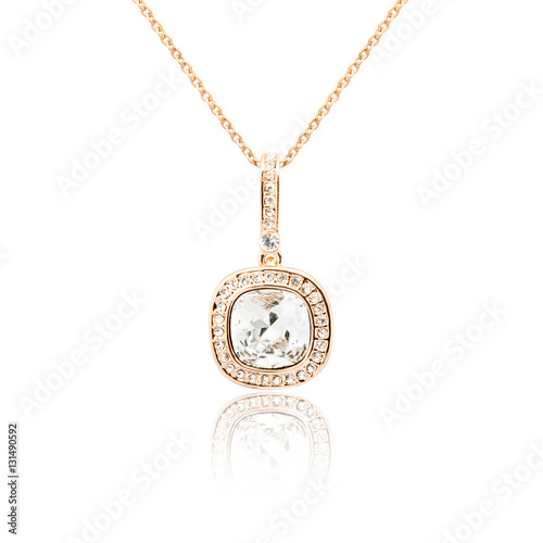 Golden pendant isolated on white