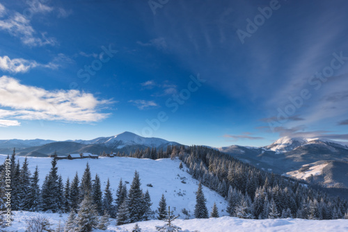 Winter landscape with snow-covered mountain villages. Carpathian
