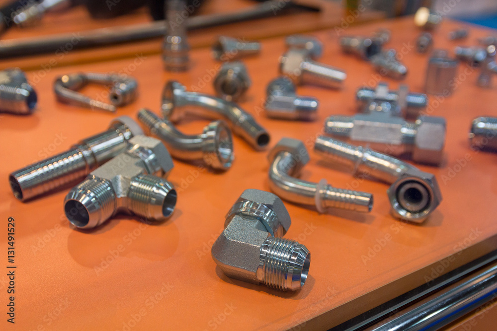 Fototapeta premium Variety of metal fittings for water on the counter. Industry