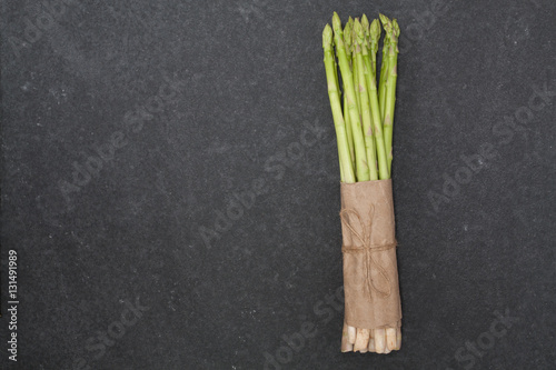 bunch of asparagus over slate
