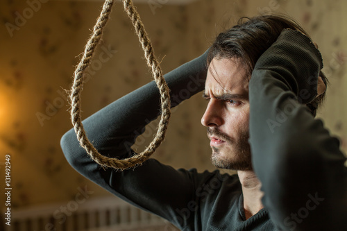 Desperate man preparing to commit suicide