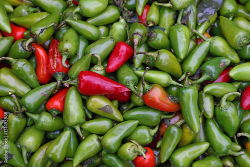 Green hot jalapeno chili peppers close up photo