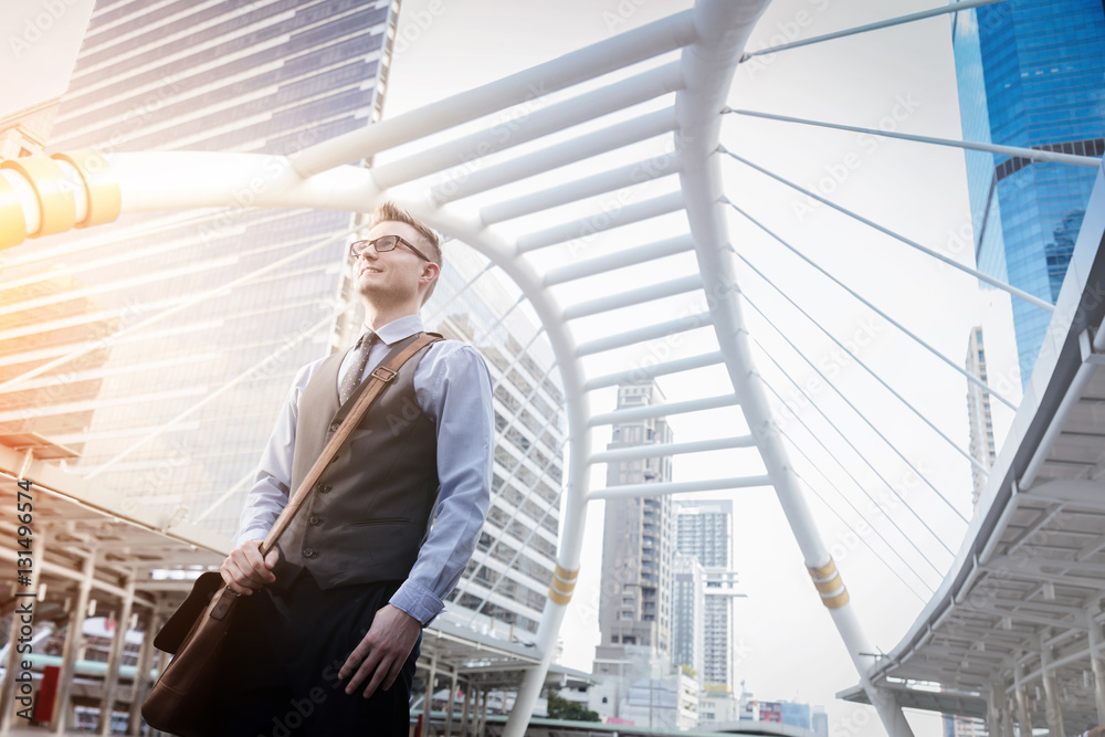 Portrait of an handsome businessman in an urban setting Portrait of an handsome businessman in an urban setting