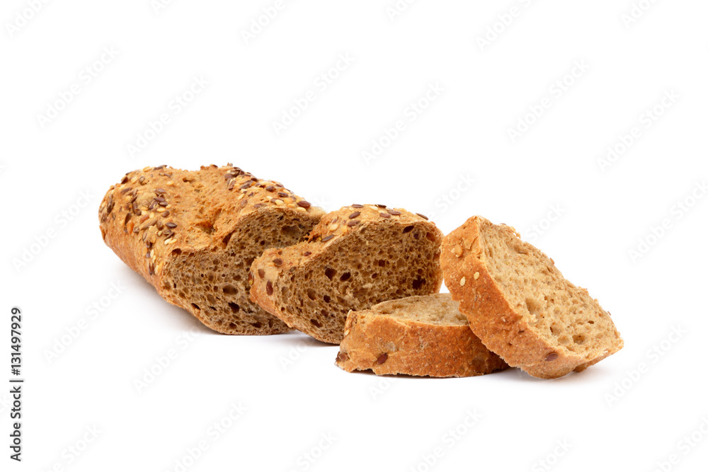 Sliced wholemeal baguette isolated on white background Sliced wholemeal baguette isolated on white background