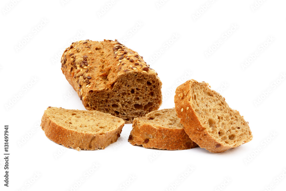 Sliced wholemeal baguette isolated on white background Sliced wholemeal baguette isolated on white background