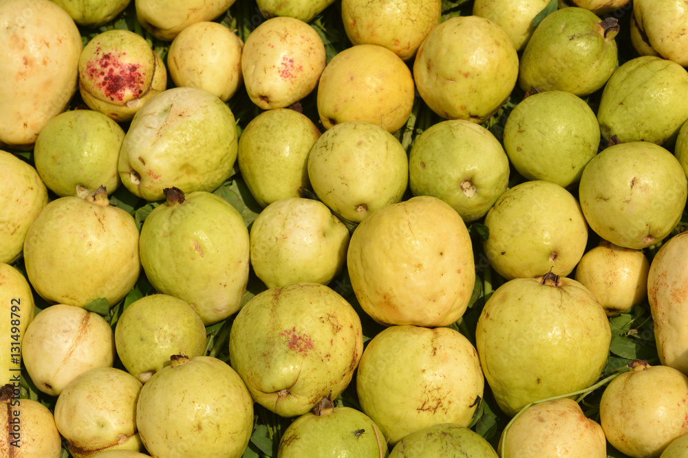Yellow Guava fruit collage making a background