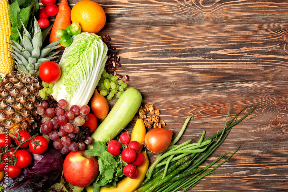 Fruits and vegetables on wooden background