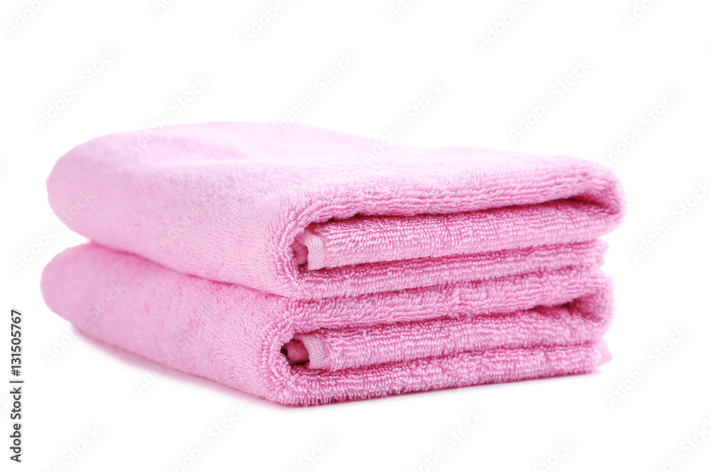 Pink towel isolated on a white background Pink towel isolated on a white background